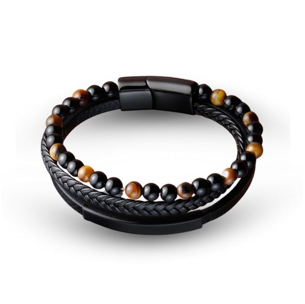 Braided Leather Bracelet King’s Edge - Williams Brothers. A black braided bracelet with brown beads on a white background. https://williamsbrothers.com.au