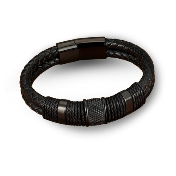 Braided Leather Bracelet Maverick – Williams Brothers. 
A Black braided leather bracelet with metal accents on a white background.  https://williamsbrothers.com.au